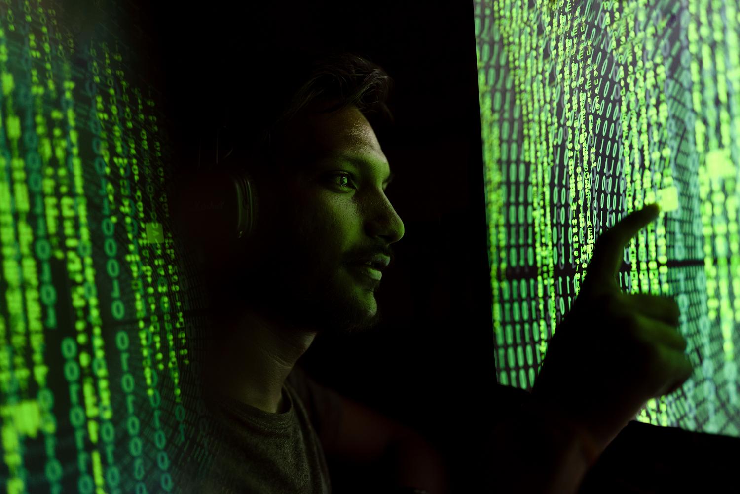 Digital interface with code and data, symbolizing asymmetric cryptography and security.